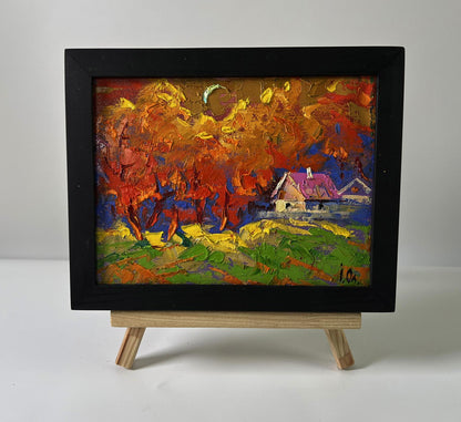 Oil painting of autumn trees by Oleksiy Ivanyuk in black frame