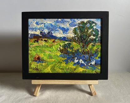 Oil painting Summer smell of grass by Oleksiy Ivanyuk in black frame
