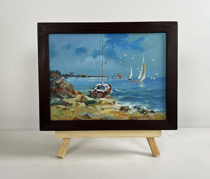 Oil painting Preparing for a sea voyage by Yuriy Suprunchuk in dark wood frame