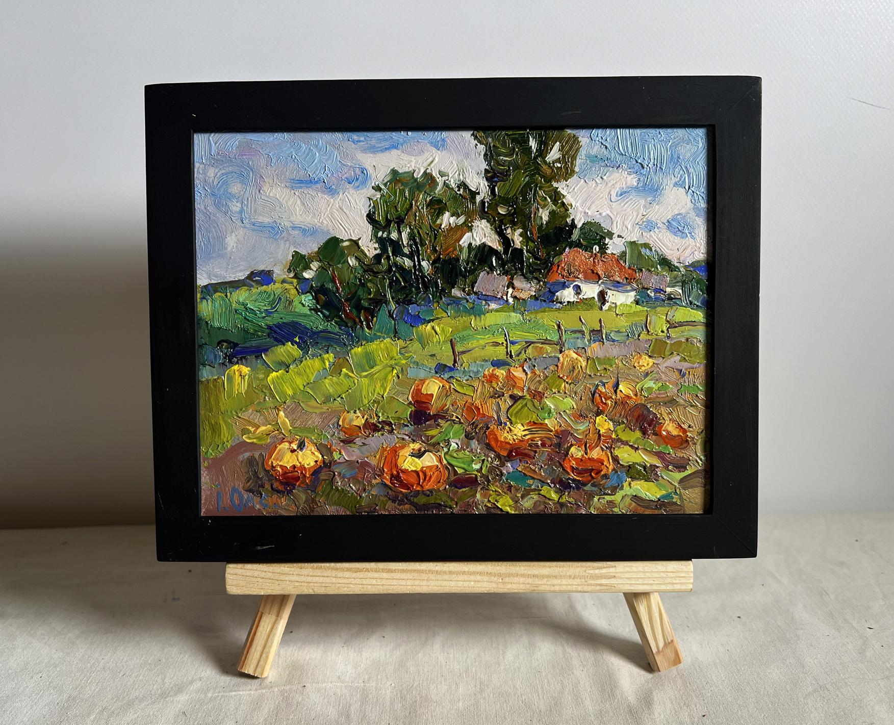 Oil painting by Oksana Ivanyuk of pumpkins in vibrant autumn garden