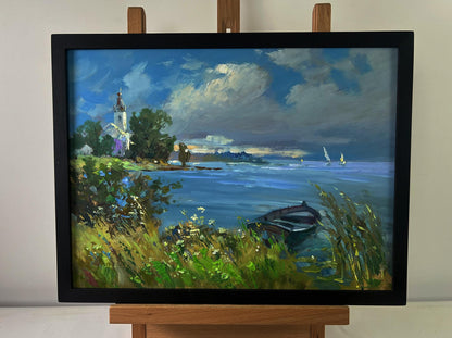 Framed oil painting of lonely boat on river bank by Yuriy Suprunchuk