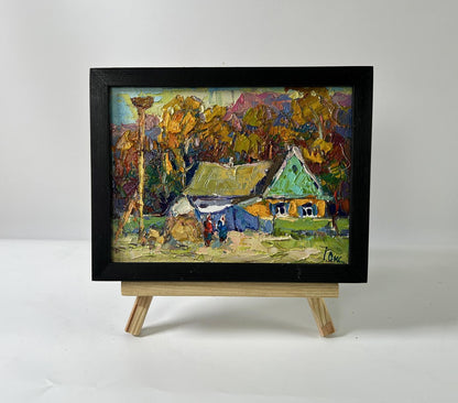 Vibrant impressionist oil painting Neighbor’s house by Oksana Ivanyuk on wooden easel