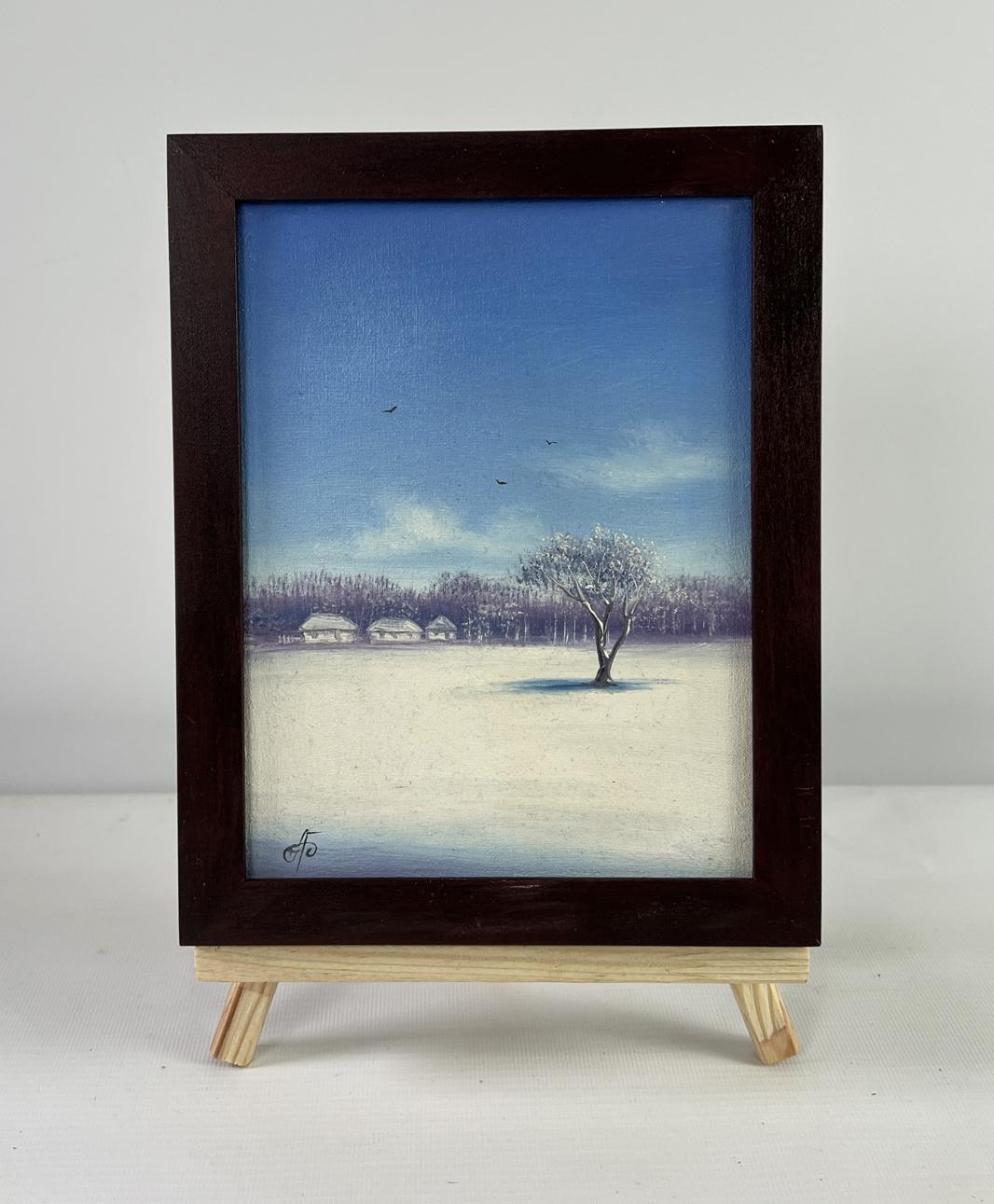 Dark wooden-framed oil painting of snowy winter landscape at dawn by Andrei Bagno