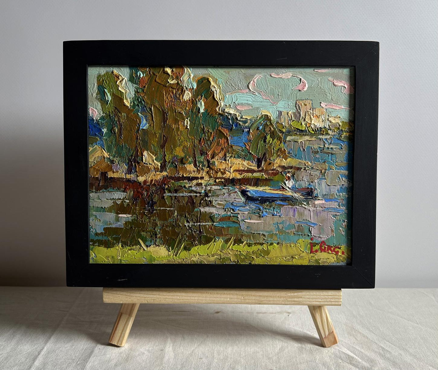 Oil painting Outside the city by boat by Oksana Ivanyuk in black frame