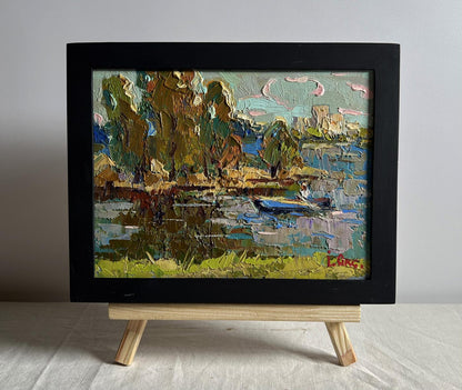 Oil painting Outside the city by boat by Oksana Ivanyuk in black frame