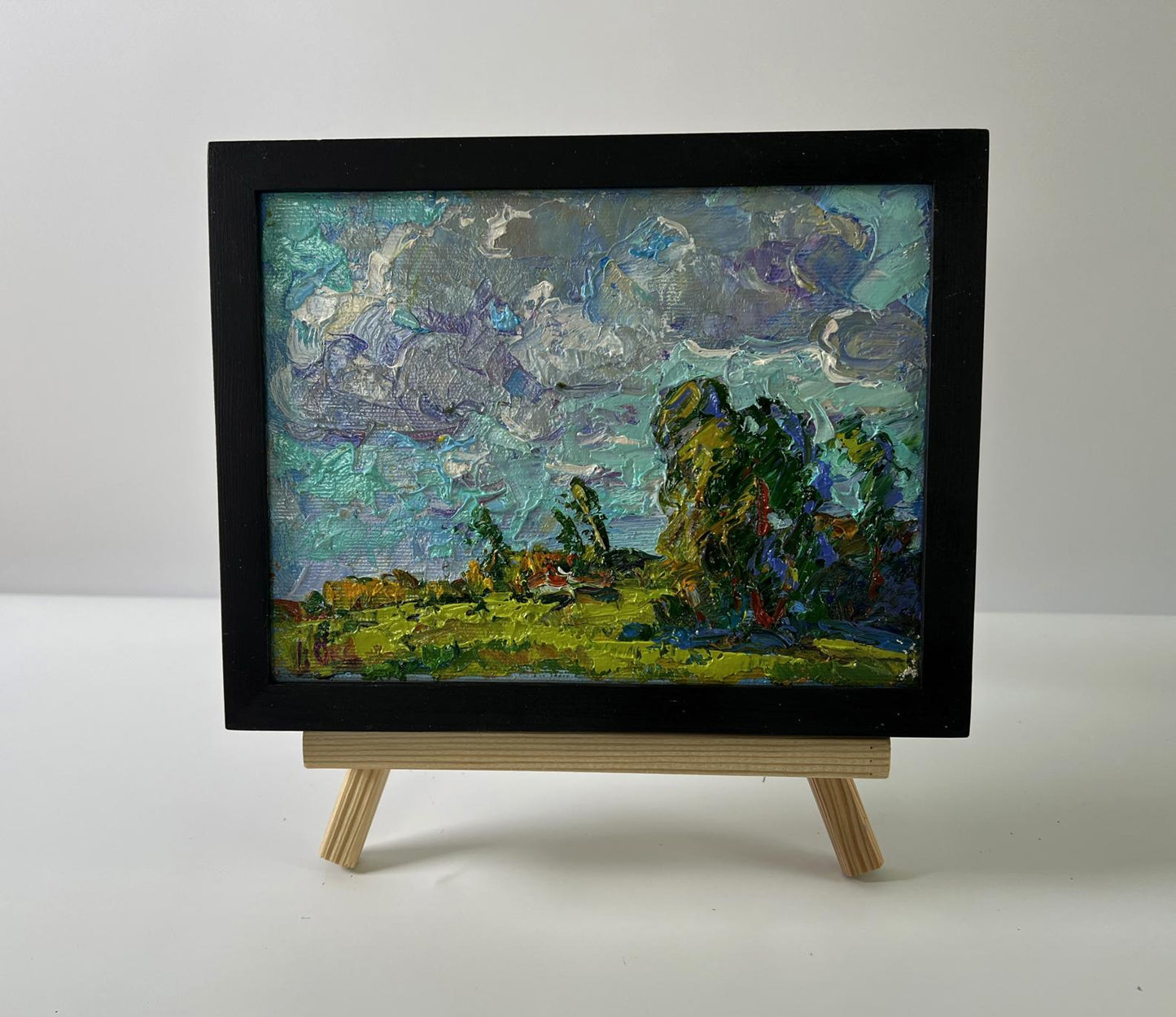 Oil painting Floating clouds by Oksana Ivanyuk: teal gray green landscape