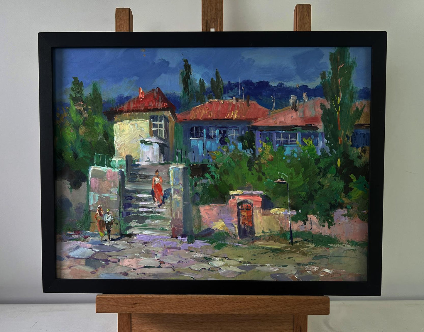 Framed oil painting of old city buildings with stairs by Yuriy Suprunchuk