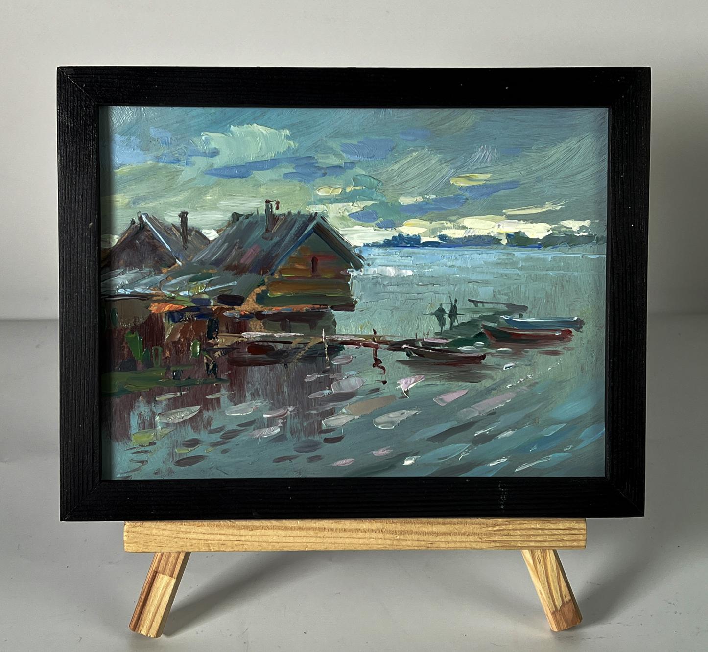 Oil painting Houses on the water by Yuriy Suprunchuk in black frame