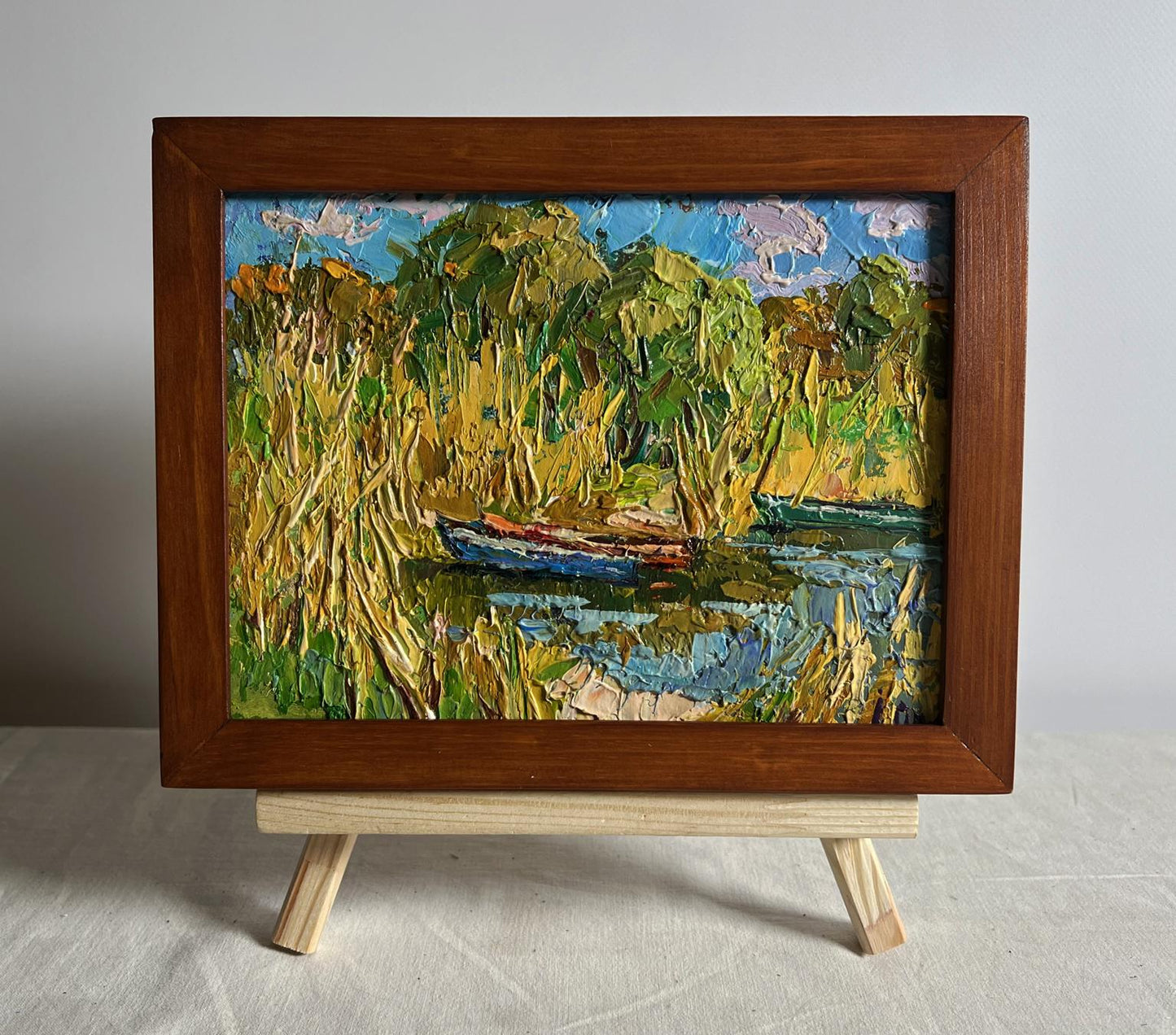 Oil painting Boats on the shore by Oleksiy Ivanyuk lakeside scene