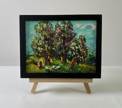 Oil painting Flowering chestnut trees by Oksana Ivanyuk in black frame