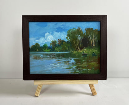 Oil painting River in green embrace by Yuriy Suprunchuk lakeside scene