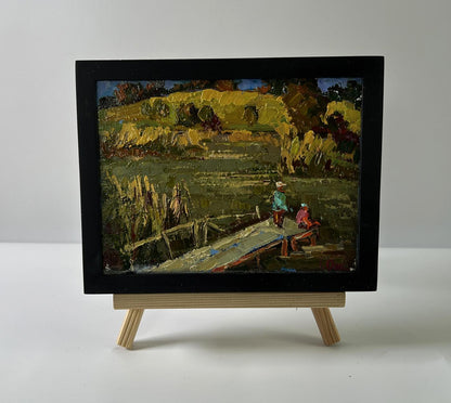 Oil painting At the Autumn Shore by Oksana Ivanyuk on wooden bridge