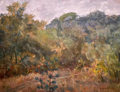 Oil painting Autumn day by Mikhail Todorov: forested hillside in autumn foliage