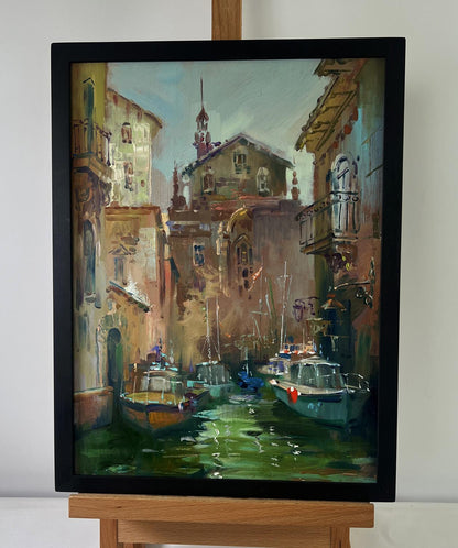 Black-framed oil painting of Venetian canal by Yuriy Suprunchuk