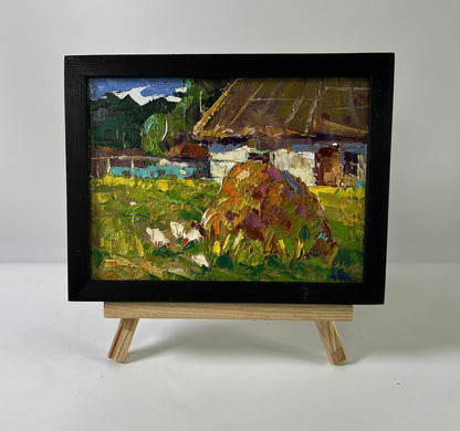 Oil painting Village courtyard by Oksana Ivanyuk in black frame