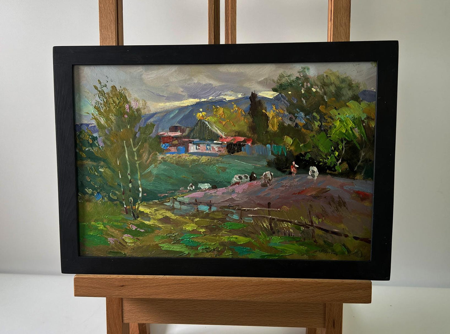 Framed oil painting of quiet village corner by Yuriy Suprunchuk