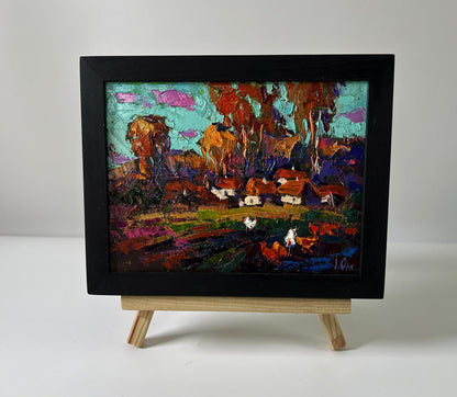 Oil painting Evening village by Oksana Ivanyuk in black frame
