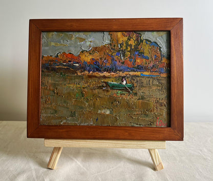 Oil painting Autumn evening silence by Oksana Ivanyuk: green boat on earthy water