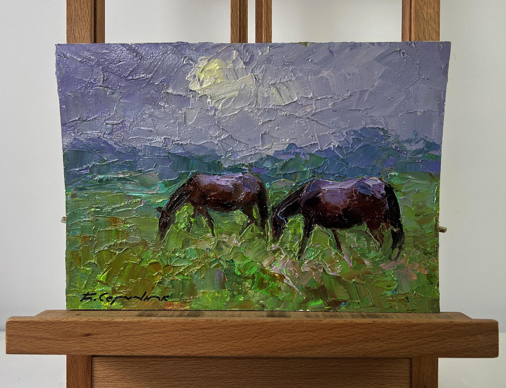 Oil painting of two brown horses grazing by Boris Serdyuk