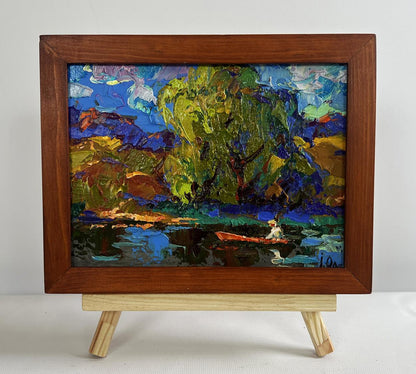 Oil painting The boat is sailing on the lake by Oleksiy Ivanyuk in wooden frame