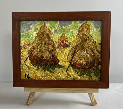Oil painting of fresh haystacks in field by Oleksiy Ivanyuk, framed