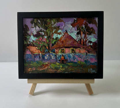 Oil painting Rural evening in the yard by Oksana Ivanyuk in black frame
