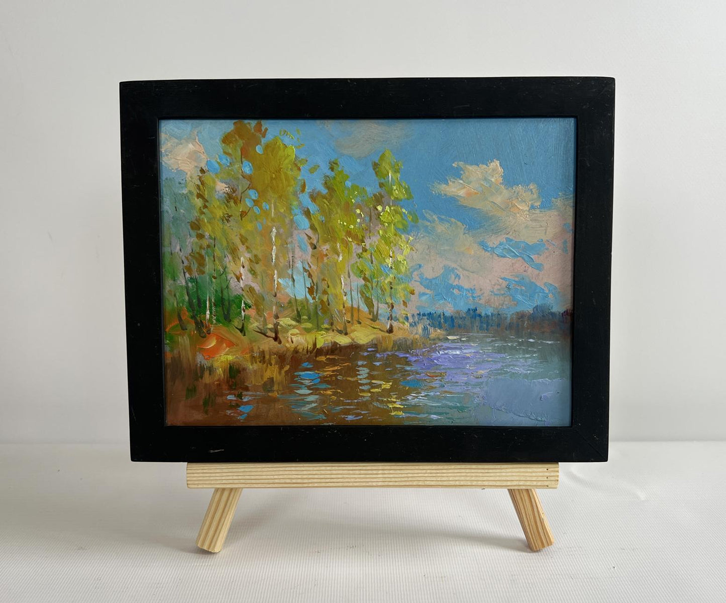 Oil painting Reflection of autumn in river by Yuriy Suprunchuk in black frame