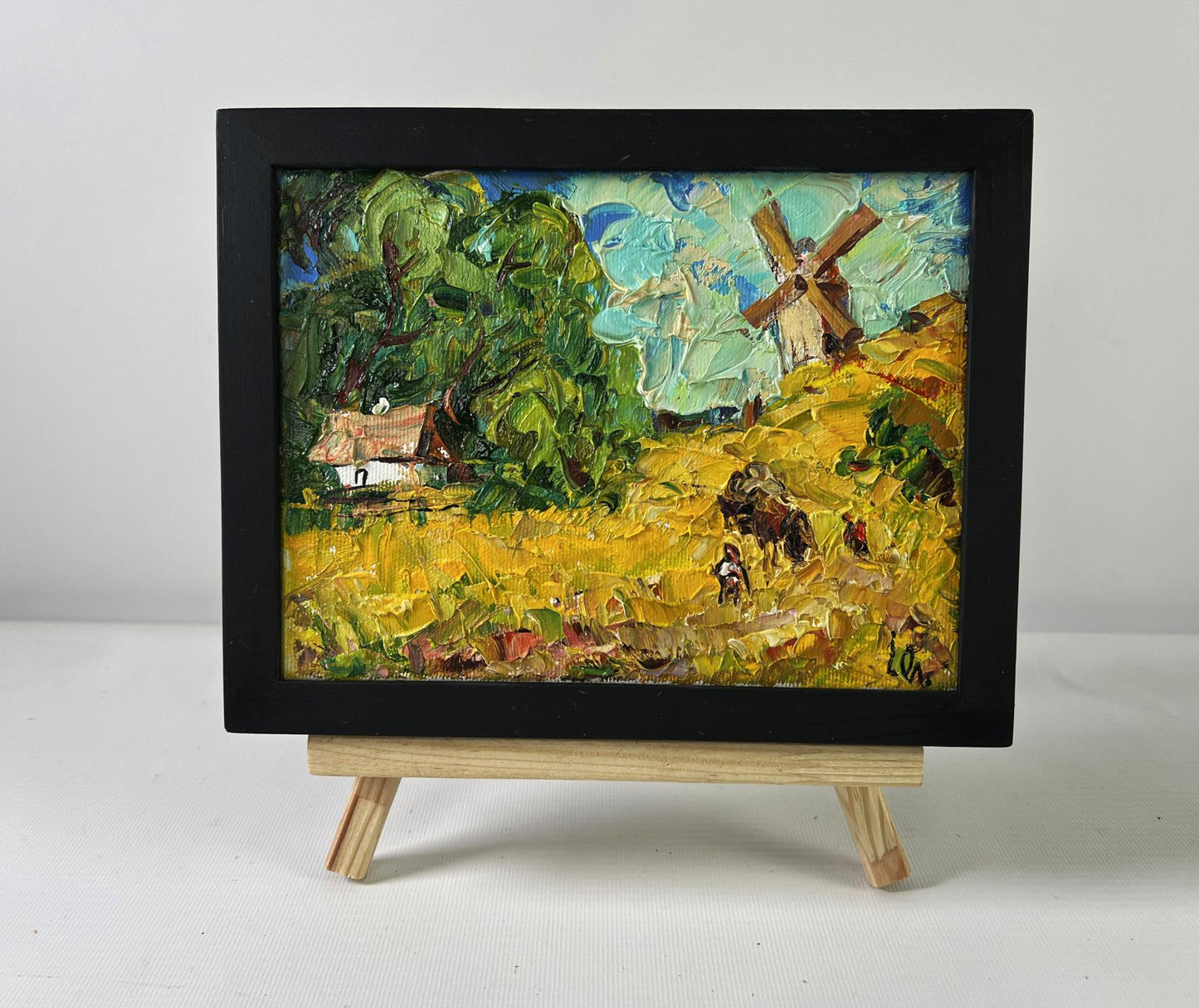 Oil painting Noon in the village by Oleksiy Ivanyuk in black frame