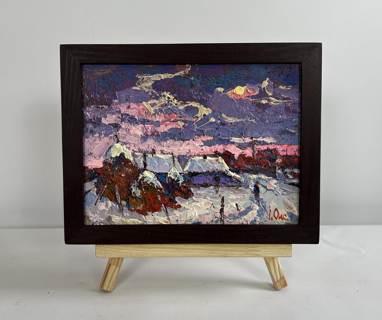 Framed Oil painting Pink winter evening by Oksana Ivanyuk snowy village dusk