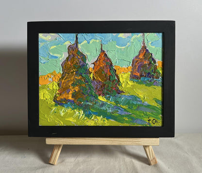 Oil painting Fragrant hay in the field by Oleksiy Ivanyuk, three pine trees