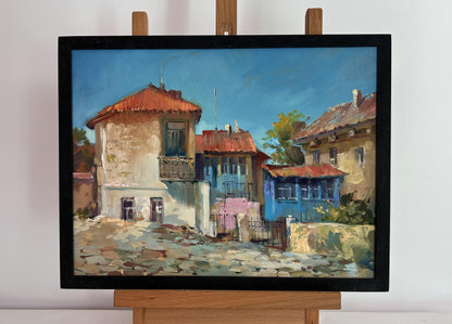 Oil painting Warm wind on the streets by Yuriy Suprunchuk, cobblestone scene