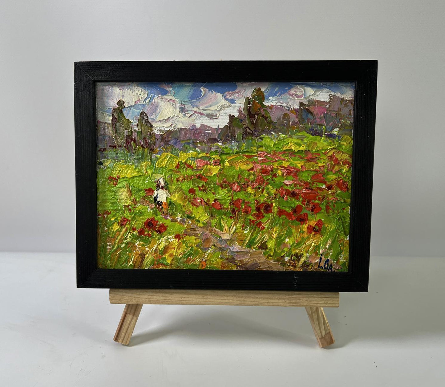 Oil painting In the Poppy Fields by Oleksiy Ivanyuk in black frame