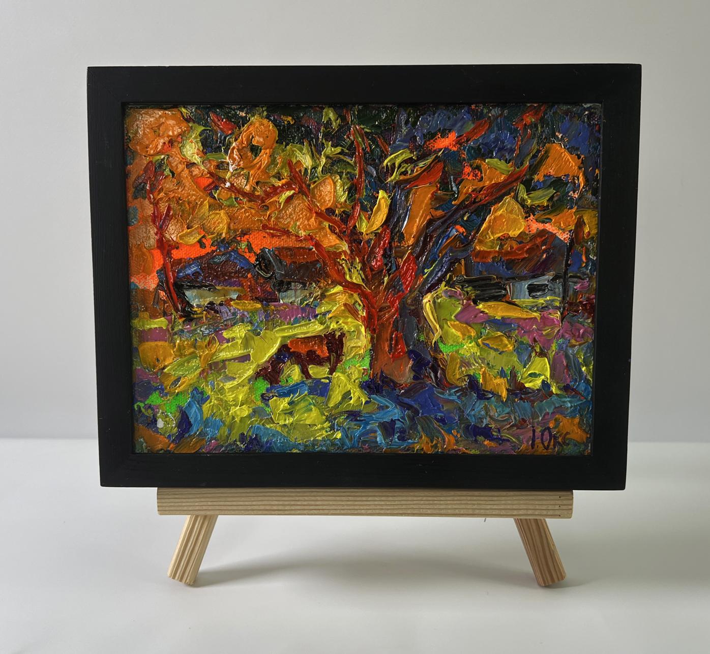 Vibrant autumn tree oil painting The sun is setting by Oksana Ivanyuk on easel