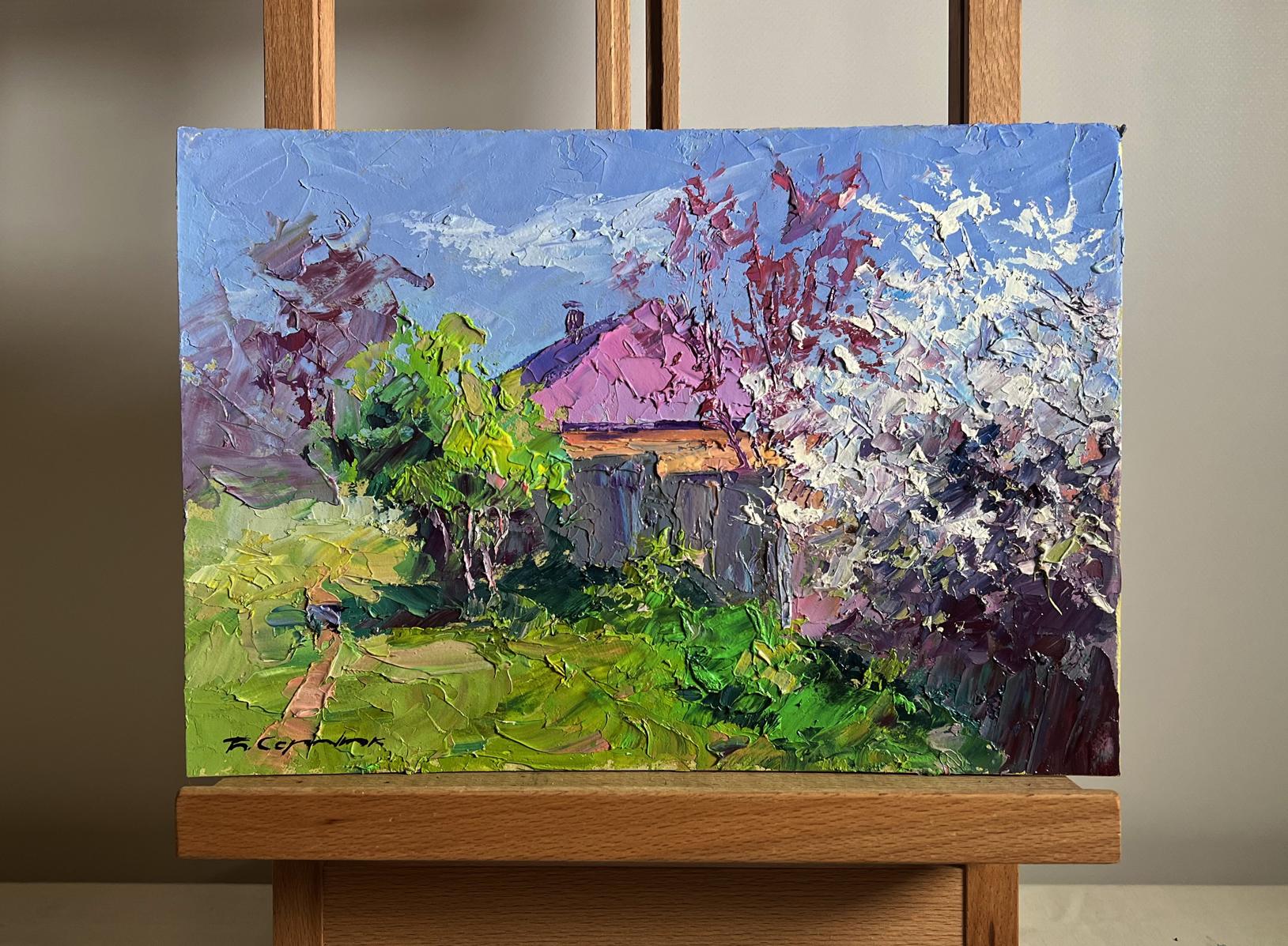 Oil painting Cherry blossom Boris Serdyuk: rustic house with pink roof in lush greenery