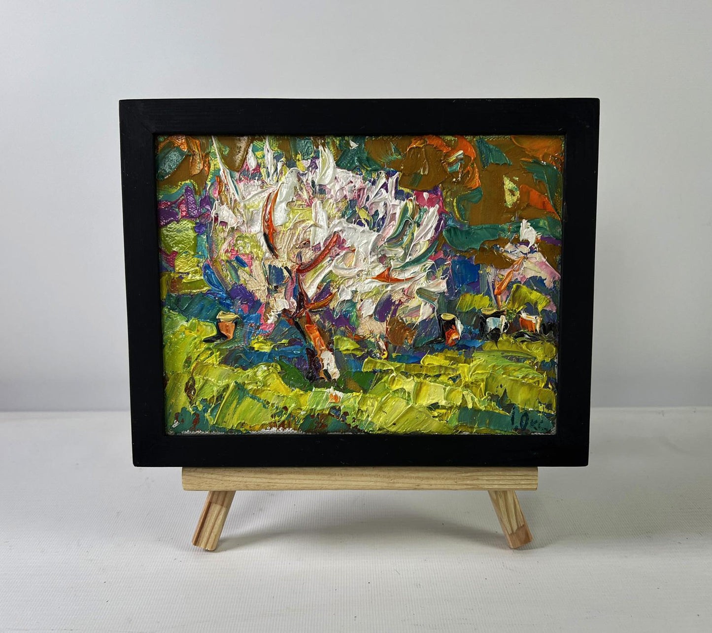 Oil painting Petals dancing in the spring breeze by Oksana Ivanyuk in black frame