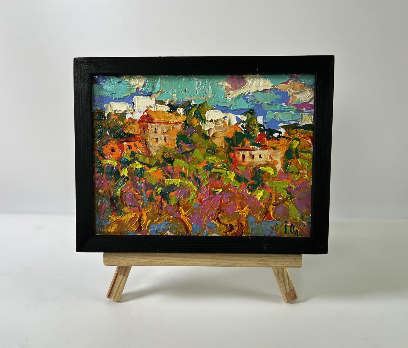 Vibrant oil painting of daytime city dynamics by Oleksiy Ivanyuk in black frame