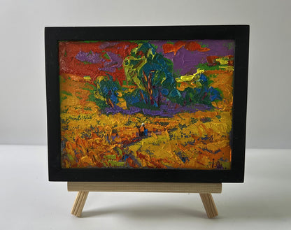 Oil painting Crimson Sunset by Oleksiy Ivanyuk in black frame