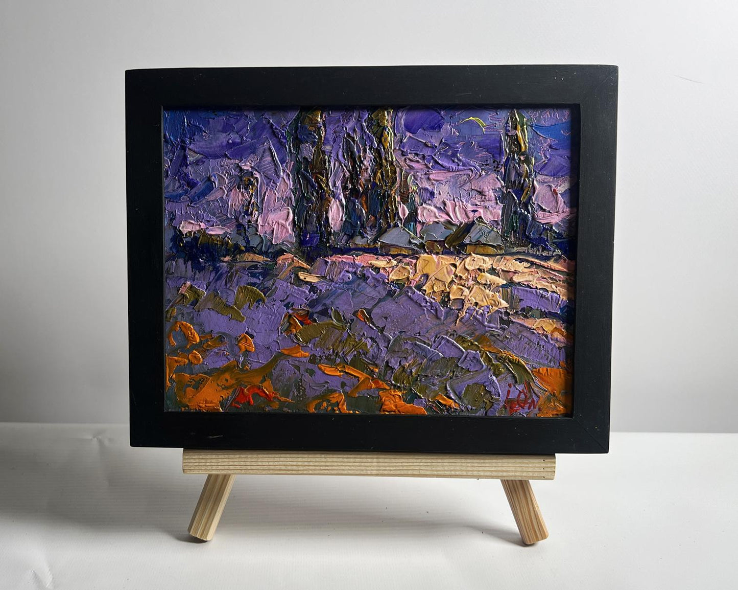 Oil painting Pink sunset on a cold day by Oleksiy Ivanyuk in black frame