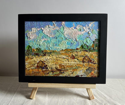 Oil painting White clouds over the field by Oleksiy Ivanyuk in black frame