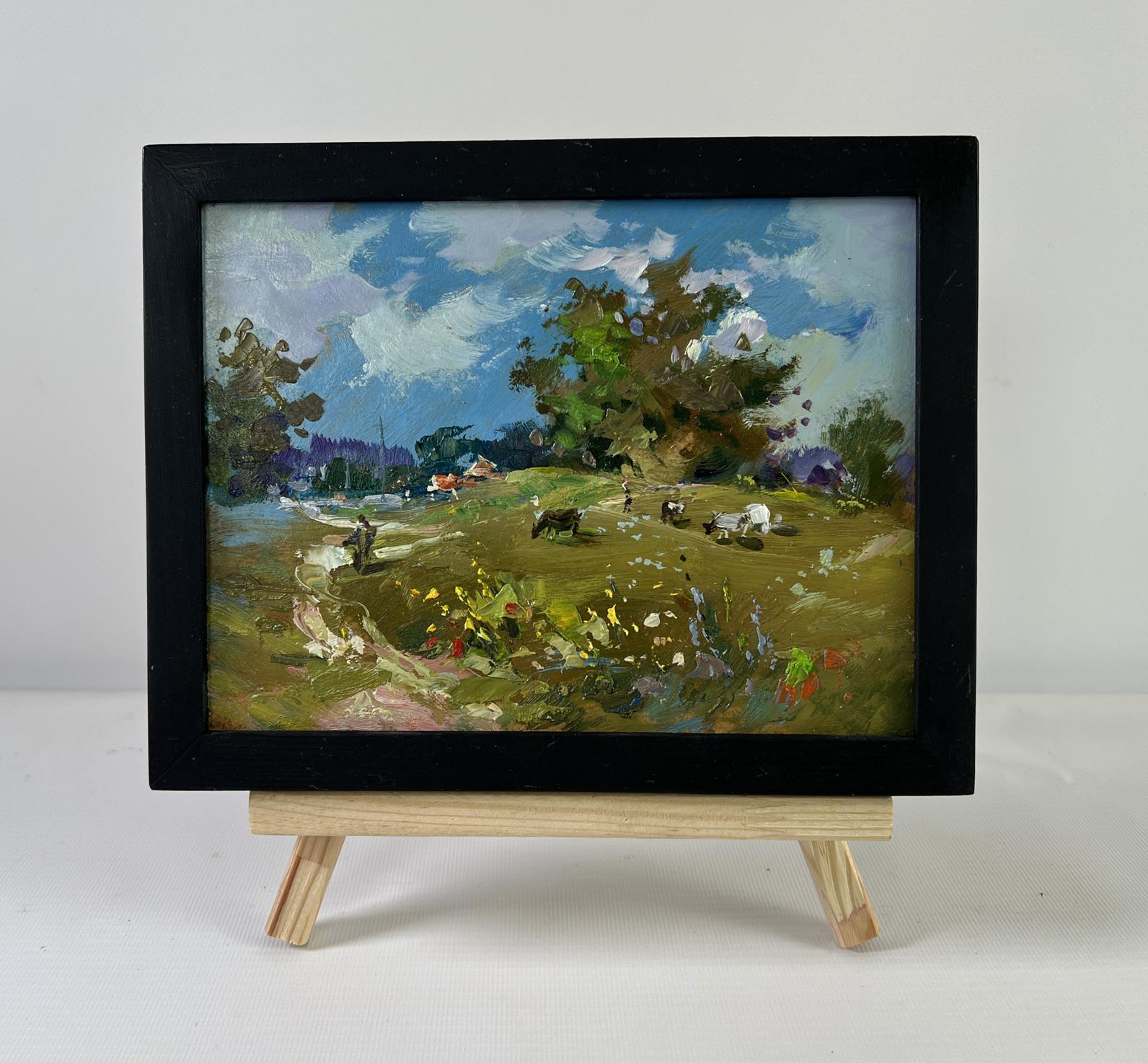 Oil painting Afternoon on the pasture by Yuriy Suprunchuk on wooden easel