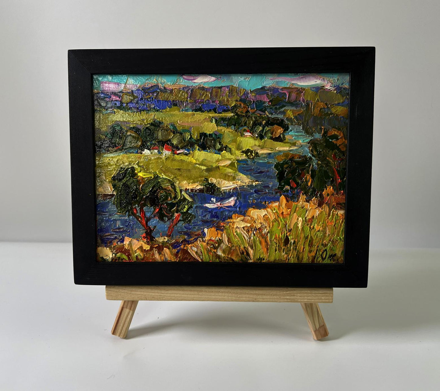 Oil painting Winding village river by Oksana Ivanyuk in black frame
