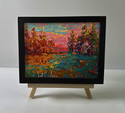 Oil painting Pink evening sunset by Oleksiy Ivanyuk in black frame