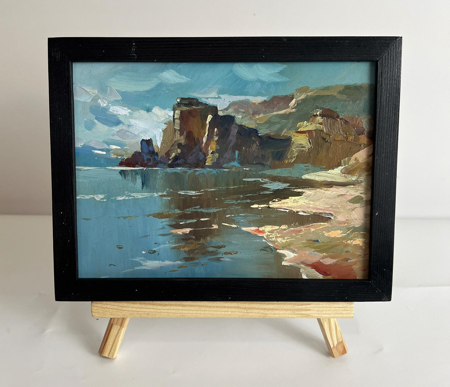 Oil painting The coast near the mountains by Yuriy Suprunchuk in black frame