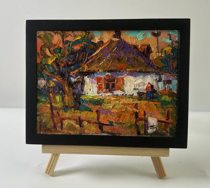 Oil painting Evening in the yard by Oksana Ivanyuk in black frame