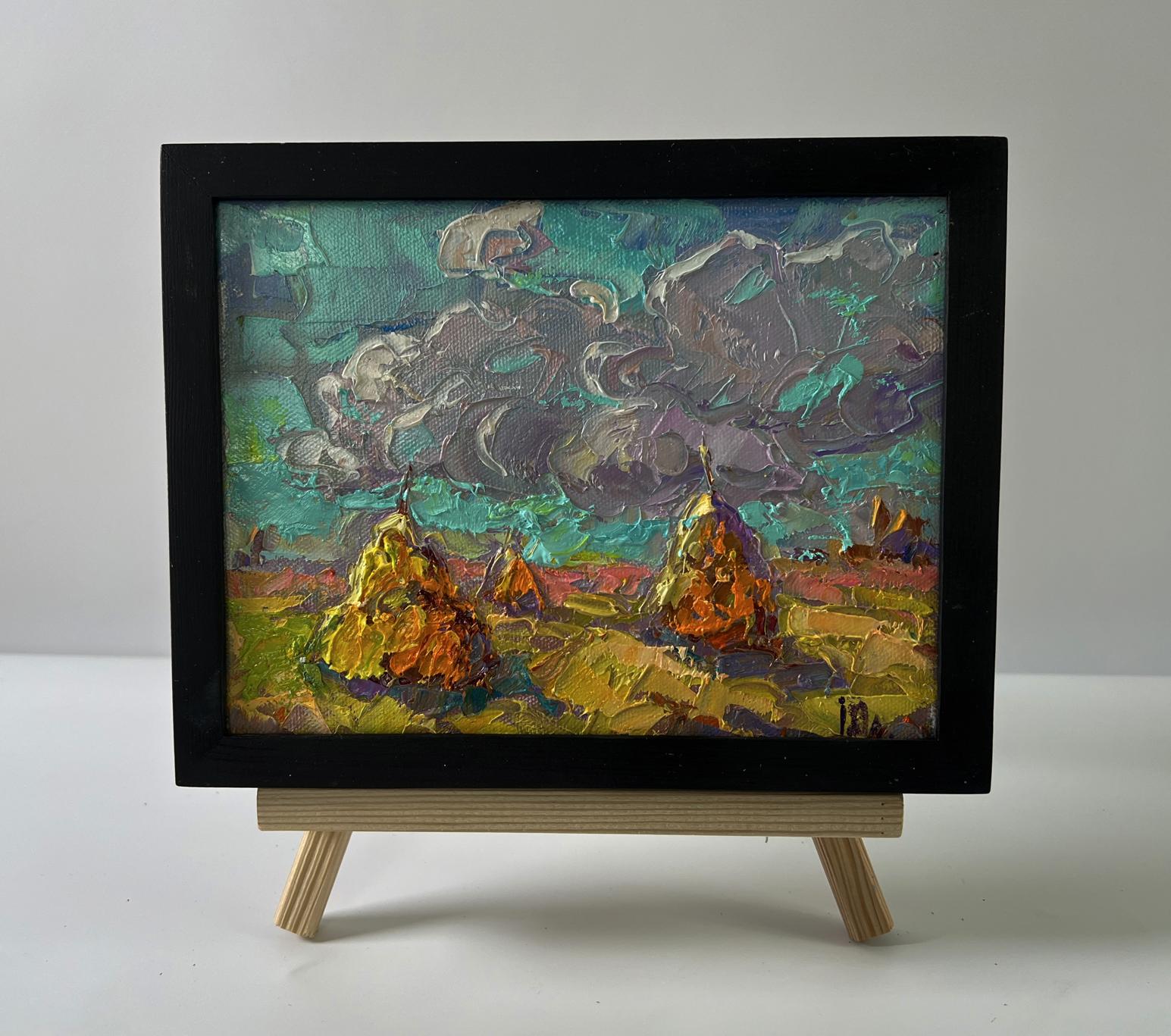 Oil painting Cloudy horizon by Oleksiy Ivanyuk: golden haystacks under teal clouds