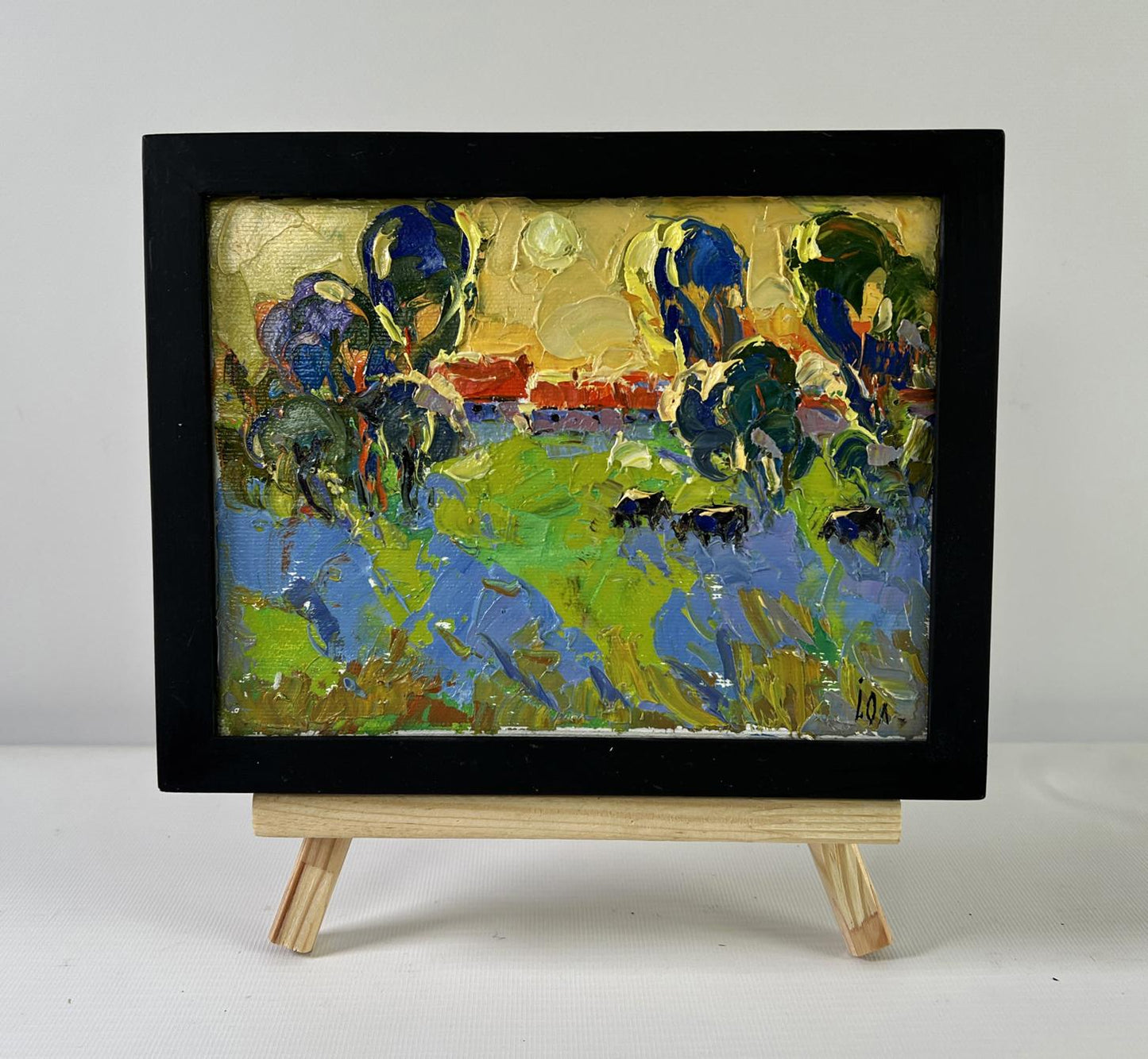 Oil painting Gold on the Horizon by Oleksiy Ivanyuk in black frame