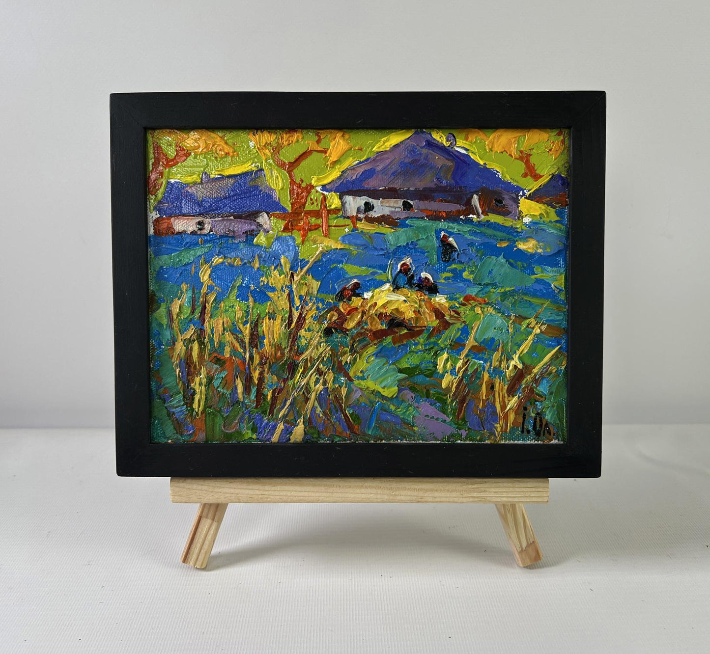 Oil painting Golden Harvest by Oleksiy Ivanyuk in black frame