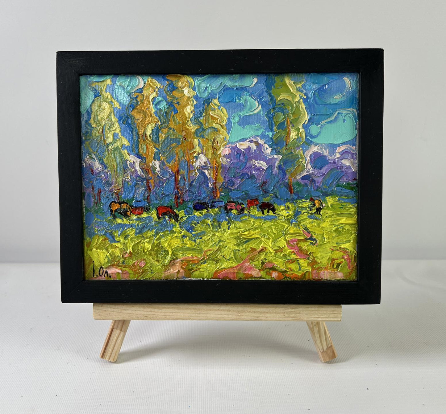 Vibrant impressionist oil painting Spring on the meadows by Oleksiy Ivanyuk on easel