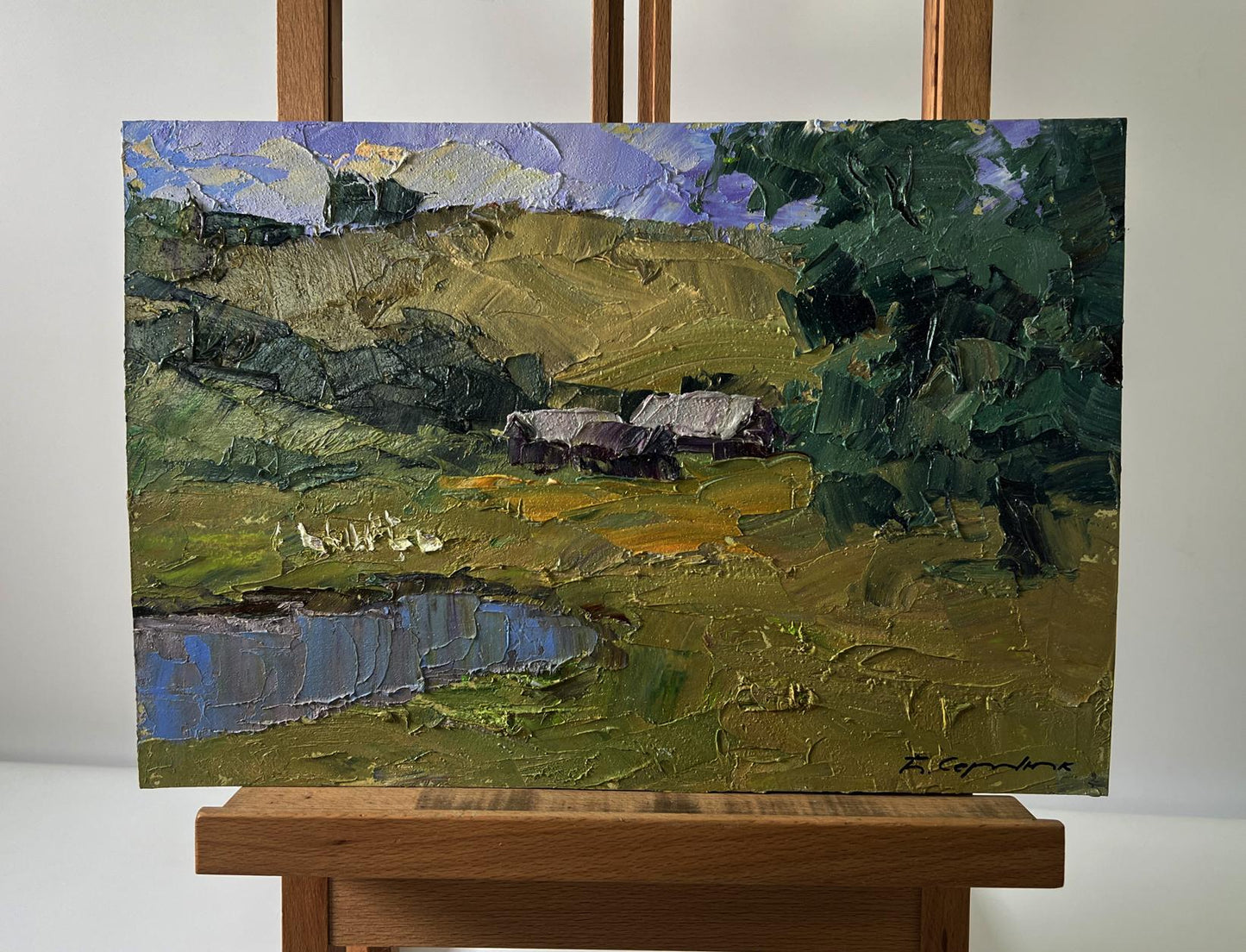 Oil painting by Boris Serdyuk of mountainous rural hills, trees, pond
