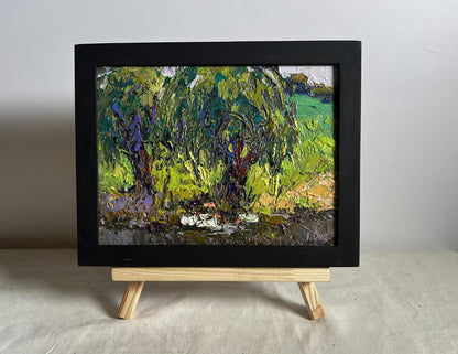 Oil painting The ducks hid near the tree by Oksana Ivanyuk on wooden easel
